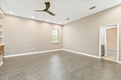 Located in Baytree, Florida, this 3,275-square-foot home sits on on Baytree National Golf Links in Florida - for sale on GolfHomes.com, golf home, golf lot
