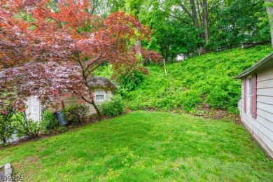Welcome to this pristine 3-bedroom, 1.1 bath side hall Colonial on Glen Ridge Country Club in New Jersey - for sale on GolfHomes.com, golf home, golf lot