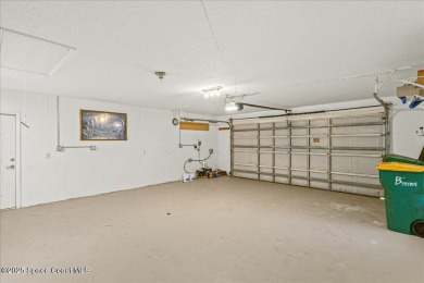 Located in Baytree, Florida, this 3,275-square-foot home sits on on Baytree National Golf Links in Florida - for sale on GolfHomes.com, golf home, golf lot