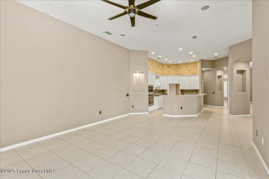 Located in Baytree, Florida, this 3,275-square-foot home sits on on Baytree National Golf Links in Florida - for sale on GolfHomes.com, golf home, golf lot