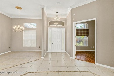 Located in Baytree, Florida, this 3,275-square-foot home sits on on Baytree National Golf Links in Florida - for sale on GolfHomes.com, golf home, golf lot