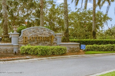 Located in Baytree, Florida, this 3,275-square-foot home sits on on Baytree National Golf Links in Florida - for sale on GolfHomes.com, golf home, golf lot