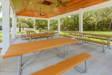 Located in Baytree, Florida, this 3,275-square-foot home sits on on Baytree National Golf Links in Florida - for sale on GolfHomes.com, golf home, golf lot