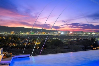Perched on an elevated golf course lot w/ unrivaled strip views on  in Nevada - for sale on GolfHomes.com, golf home, golf lot