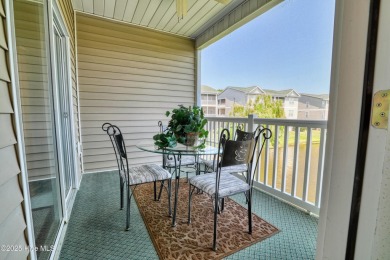 **TURN-KEY COASTAL CONDO IN SUNSET VILLAGE-FULLY FURNISHED-POND on Sandpiper Bay Golf and Country Club in North Carolina - for sale on GolfHomes.com, golf home, golf lot