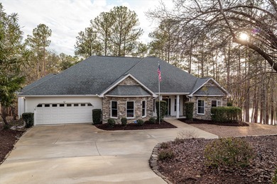 Waterfront lake home with nearly 5,000 square feet in desirable on Monticello Golf Club At Savannah Lakes in South Carolina - for sale on GolfHomes.com, golf home, golf lot