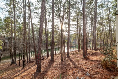 Waterfront lake home with nearly 5,000 square feet in desirable on Monticello Golf Club At Savannah Lakes in South Carolina - for sale on GolfHomes.com, golf home, golf lot