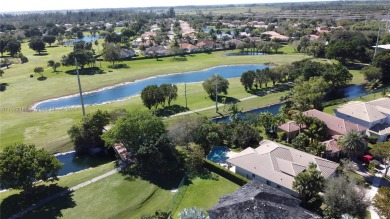 Luxurious Palm Isles Estates in Keys Gate. This 4 bedroom, 3 on Keys Gate Golf Club in Florida - for sale on GolfHomes.com, golf home, golf lot
