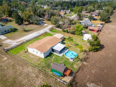 An incredible opportunity awaits with this spacious 4-bedroom on Black Bear Golf Club in Florida - for sale on GolfHomes.com, golf home, golf lot