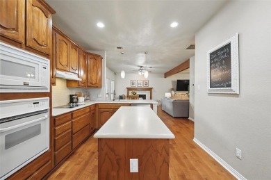 Enjoy this wonderfully updated and maintained home nestled on Grand Oaks Golf Club in Texas - for sale on GolfHomes.com, golf home, golf lot