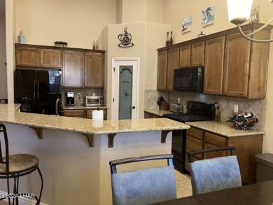 Least expensive 3 bd/2 ba home with a 2 car garage on the island on Havasu Island Golf Course in Arizona - for sale on GolfHomes.com, golf home, golf lot