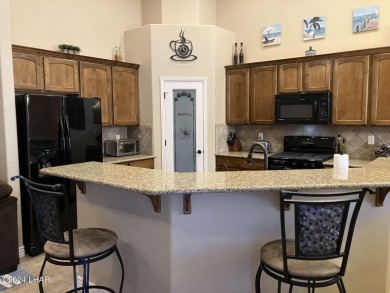 Least expensive 3 bd/2 ba home with a 2 car garage on the island on Havasu Island Golf Course in Arizona - for sale on GolfHomes.com, golf home, golf lot