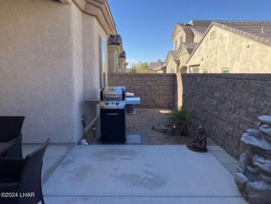 Least expensive 3 bd/2 ba home with a 2 car garage on the island on Havasu Island Golf Course in Arizona - for sale on GolfHomes.com, golf home, golf lot