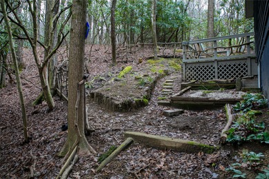 This beautifully updated 4BR, 3BA home in the sought-after on Connestee Falls Golf Club in North Carolina - for sale on GolfHomes.com, golf home, golf lot