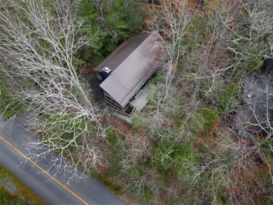 This beautifully updated 4BR, 3BA home in the sought-after on Connestee Falls Golf Club in North Carolina - for sale on GolfHomes.com, golf home, golf lot