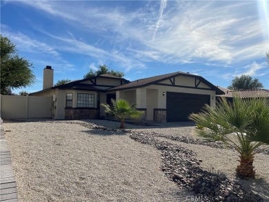 Welcome to this inviting 3-bedroom, 2-bathroom home in a on Spring Valley Lake Country Club in California - for sale on GolfHomes.com, golf home, golf lot