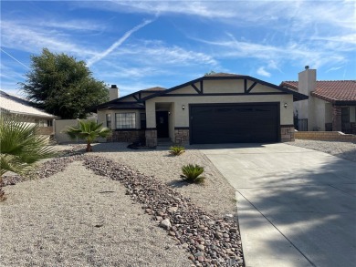 Welcome to this inviting 3-bedroom, 2-bathroom home in a on Spring Valley Lake Country Club in California - for sale on GolfHomes.com, golf home, golf lot