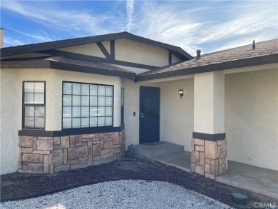 Welcome to this inviting 3-bedroom, 2-bathroom home in a on Spring Valley Lake Country Club in California - for sale on GolfHomes.com, golf home, golf lot