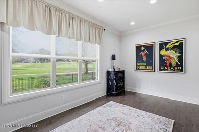 Golf course and lake views come together at 387 Caroline Blvd in on Lake Caroline Golf Club in Mississippi - for sale on GolfHomes.com, golf home, golf lot