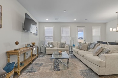 Discover the perfect blend of space, style, and serenity in this on Barefoot Resort and Golf Club  in South Carolina - for sale on GolfHomes.com, golf home, golf lot