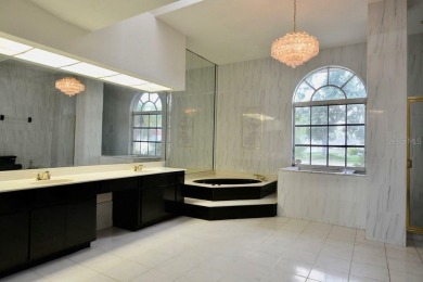 What a find in this neighborhood of picturesque homes!  Tucked on Deep Creek Golf Club in Florida - for sale on GolfHomes.com, golf home, golf lot