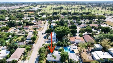 Main House + Efficiency House (can be extra income). Desirable on West Palm Beach Golf Course in Florida - for sale on GolfHomes.com, golf home, golf lot