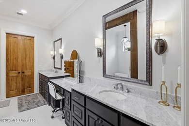 Golf course and lake views come together at 387 Caroline Blvd in on Lake Caroline Golf Club in Mississippi - for sale on GolfHomes.com, golf home, golf lot