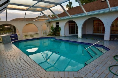 What a find in this neighborhood of picturesque homes!  Tucked on Deep Creek Golf Club in Florida - for sale on GolfHomes.com, golf home, golf lot