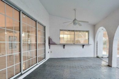 What a find in this neighborhood of picturesque homes!  Tucked on Deep Creek Golf Club in Florida - for sale on GolfHomes.com, golf home, golf lot