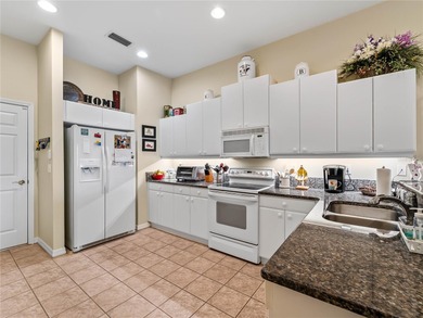 Welcome to 2155 Lynx Run, a custom-built villa tucked inside one on Bobcat Trail Golf Club in Florida - for sale on GolfHomes.com, golf home, golf lot