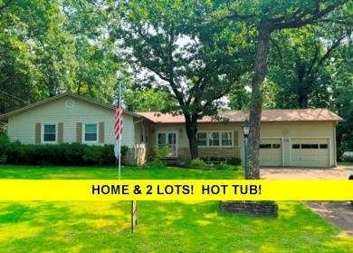 THIS ONE HAS IT ALL!! 3 bdrm, 1 3/4 bath, bonus room off kitchen on Cherokee Village North Course in Arkansas - for sale on GolfHomes.com, golf home, golf lot