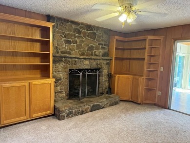 THIS ONE HAS IT ALL!! 3 bdrm, 1 3/4 bath, bonus room off kitchen on Cherokee Village North Course in Arkansas - for sale on GolfHomes.com, golf home, golf lot