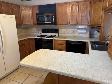 THIS ONE HAS IT ALL!! 3 bdrm, 1 3/4 bath, bonus room off kitchen on Cherokee Village North Course in Arkansas - for sale on GolfHomes.com, golf home, golf lot