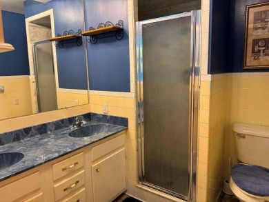 THIS ONE HAS IT ALL!! 3 bdrm, 1 3/4 bath, bonus room off kitchen on Cherokee Village North Course in Arkansas - for sale on GolfHomes.com, golf home, golf lot