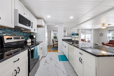 Step right up to your next chapter of fabulous living in this on Maple Leaf Golf and Country Club in Florida - for sale on GolfHomes.com, golf home, golf lot