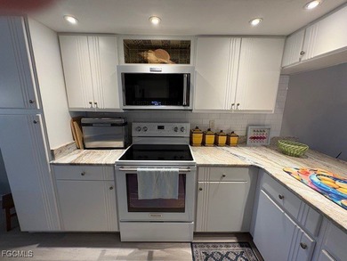 Main floor unit in desirable Clubhouse Village at Cross Creek on Cross Creek Country Club in Florida - for sale on GolfHomes.com, golf home, golf lot