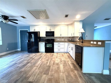 DISCOVER SERENITY IN YOUR PRIVATE BACKYARD OASIS! This 3-BEDROOM on Rio Pinar Golf and Country Club in Florida - for sale on GolfHomes.com, golf home, golf lot