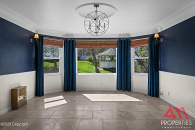 Experience refined elegance in this over 5,000 sq ft on Bell Nob Golf Course in Wyoming - for sale on GolfHomes.com, golf home, golf lot