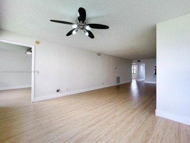 This unit is a RENOVATED & UPDATED -1370 SF 2BR/2BA unit in the on Sunrise Lakes Phase IV Golf Course in Florida - for sale on GolfHomes.com, golf home, golf lot