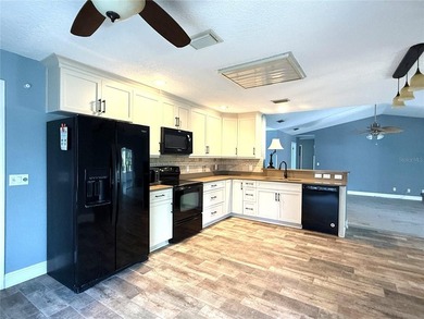 DISCOVER SERENITY IN YOUR PRIVATE BACKYARD OASIS! This 3-BEDROOM on Rio Pinar Golf and Country Club in Florida - for sale on GolfHomes.com, golf home, golf lot