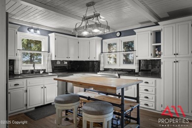 Experience refined elegance in this over 5,000 sq ft on Bell Nob Golf Course in Wyoming - for sale on GolfHomes.com, golf home, golf lot