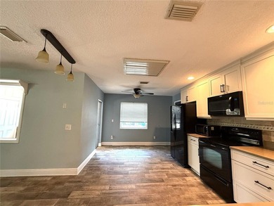 DISCOVER SERENITY IN YOUR PRIVATE BACKYARD OASIS! This 3-BEDROOM on Rio Pinar Golf and Country Club in Florida - for sale on GolfHomes.com, golf home, golf lot