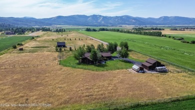 The setting of this Victor estate is magical!   At the end of a on Teton Springs Resort and Club in Idaho - for sale on GolfHomes.com, golf home, golf lot