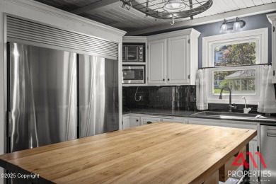 Experience refined elegance in this over 5,000 sq ft on Bell Nob Golf Course in Wyoming - for sale on GolfHomes.com, golf home, golf lot