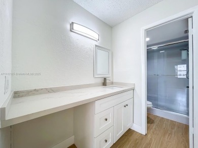 This unit is a RENOVATED & UPDATED -1370 SF 2BR/2BA unit in the on Sunrise Lakes Phase IV Golf Course in Florida - for sale on GolfHomes.com, golf home, golf lot