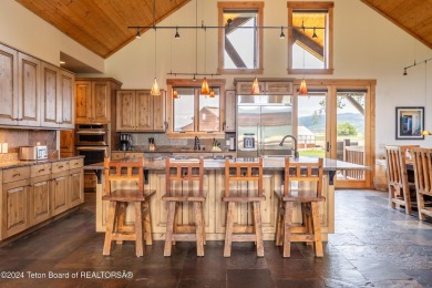 The setting of this Victor estate is magical!   At the end of a on Teton Springs Resort and Club in Idaho - for sale on GolfHomes.com, golf home, golf lot