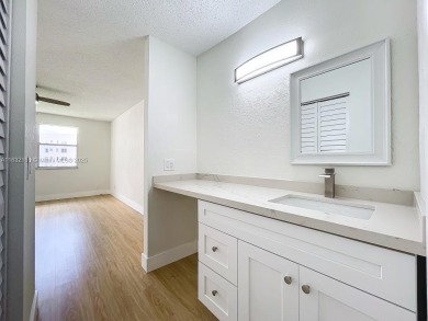 This unit is a RENOVATED & UPDATED -1370 SF 2BR/2BA unit in the on Sunrise Lakes Phase IV Golf Course in Florida - for sale on GolfHomes.com, golf home, golf lot