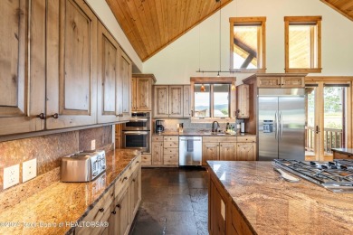 The setting of this Victor estate is magical!   At the end of a on Teton Springs Resort and Club in Idaho - for sale on GolfHomes.com, golf home, golf lot