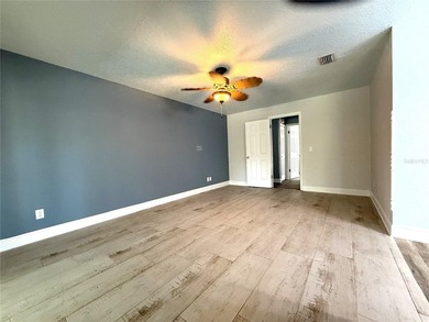 DISCOVER SERENITY IN YOUR PRIVATE BACKYARD OASIS! This 3-BEDROOM on Rio Pinar Golf and Country Club in Florida - for sale on GolfHomes.com, golf home, golf lot