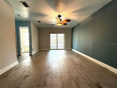 DISCOVER SERENITY IN YOUR PRIVATE BACKYARD OASIS! This 3-BEDROOM on Rio Pinar Golf and Country Club in Florida - for sale on GolfHomes.com, golf home, golf lot